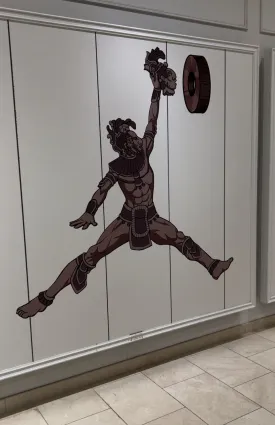 Giant Origins sticker wall