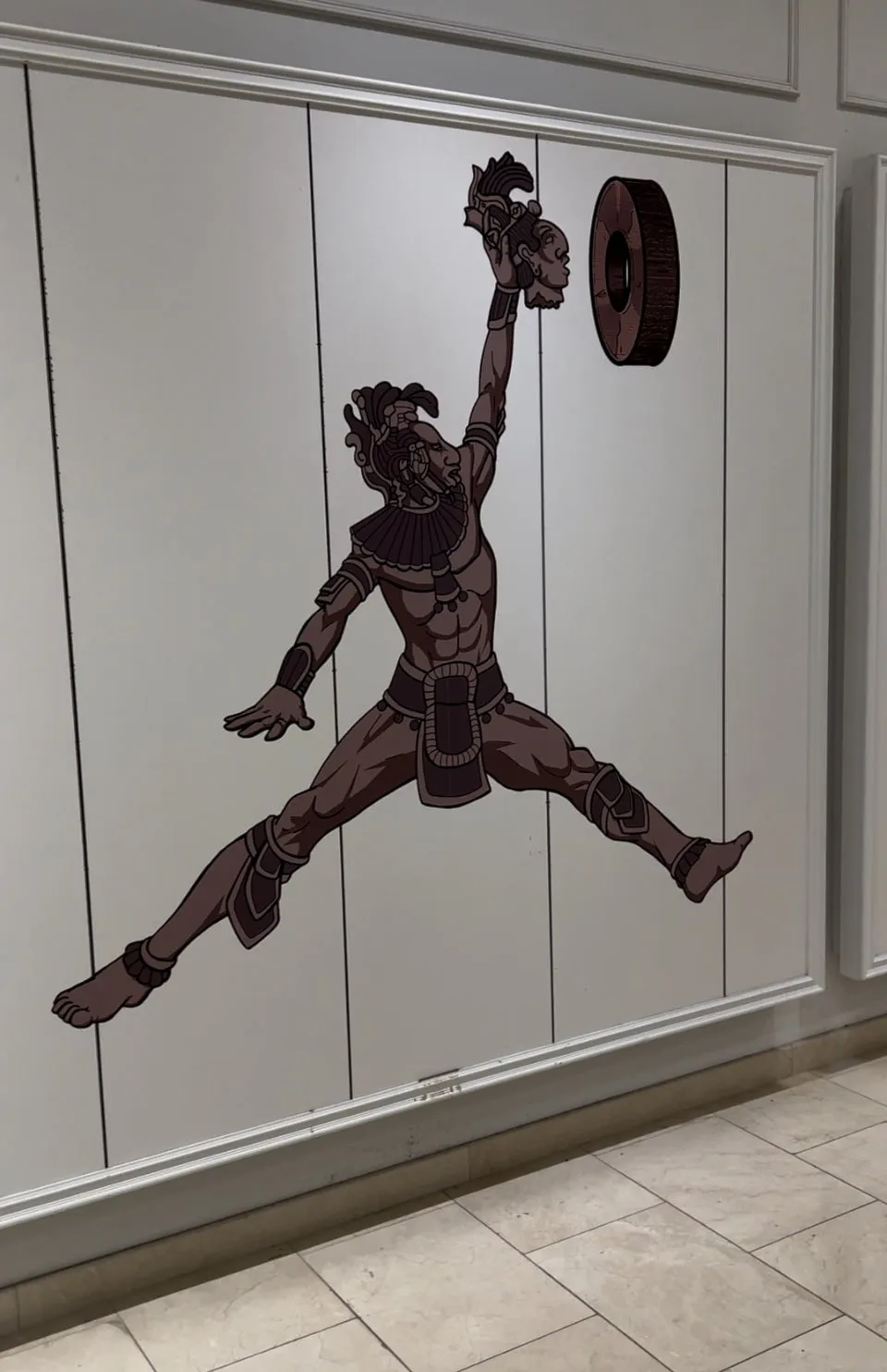 Giant Origins sticker wall
